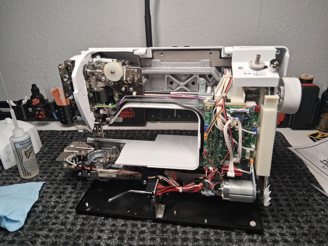 Residential sewing machine being serviced